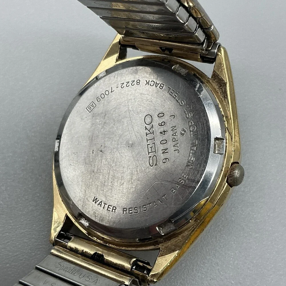 Vintage Seiko Mens Watch 34mm Gold Tone Stretch Band Date 8222-7009 New Battery